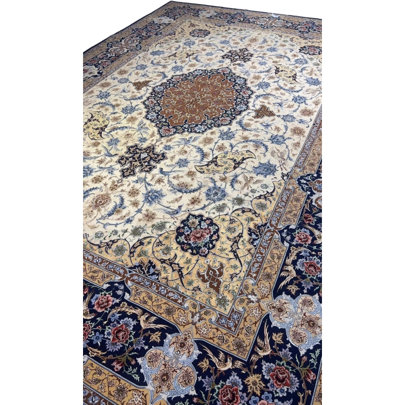 "Golden Isfahan rug with a deep blue border and detailed floral designs, handwoven by Master Hassan Dardashtie."