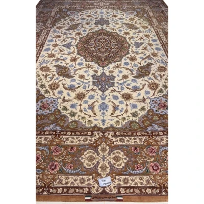 "Hand-knotted Isfahan rug featuring a silk medallion and borders with a wool floor, crafted by Late Master Hassan Dardashtie."
