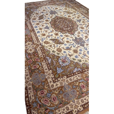 "Master Hassan Dardashtie’s handwoven rug with silk accents and natural dye colors."