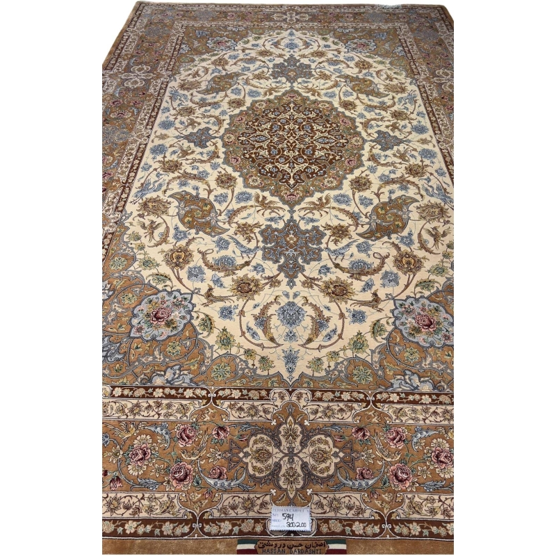 "Detailed Persian Isfahan rug showcasing a silk medallion design and intricate craftsmanship."