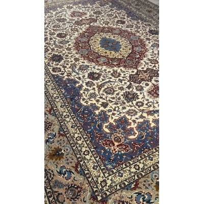 "Detailed border design on Isfahan Persian rug by Master Zolfagharie."