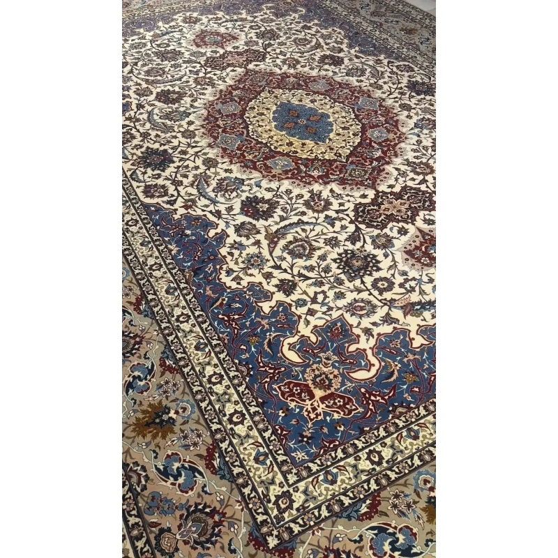 "Detailed border design on Isfahan Persian rug by Master Zolfagharie."