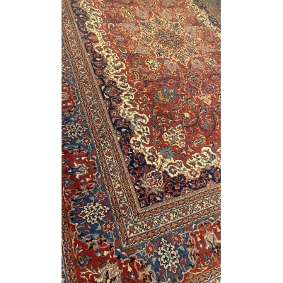 "Detailed antique Persian rug with medallion and curvilinear islimi motifs"