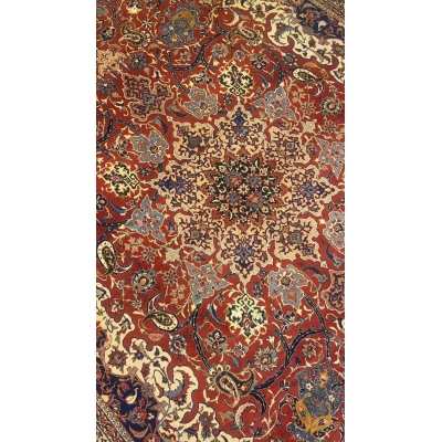 "Hand-knotted Isfahan rug with classic floral design in rich colors"
