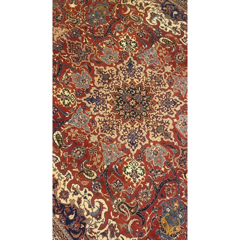 "Hand-knotted Isfahan rug with classic floral design in rich colors"