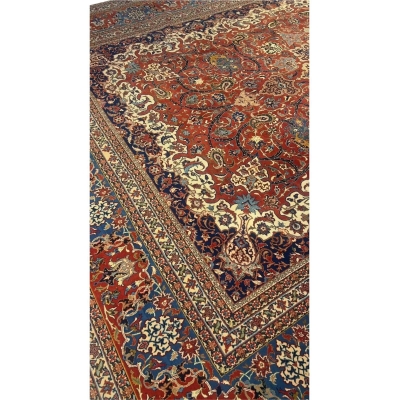 "Detailed view of luxury hand-knotted Isfahan rug with traditional mid-century motifs"