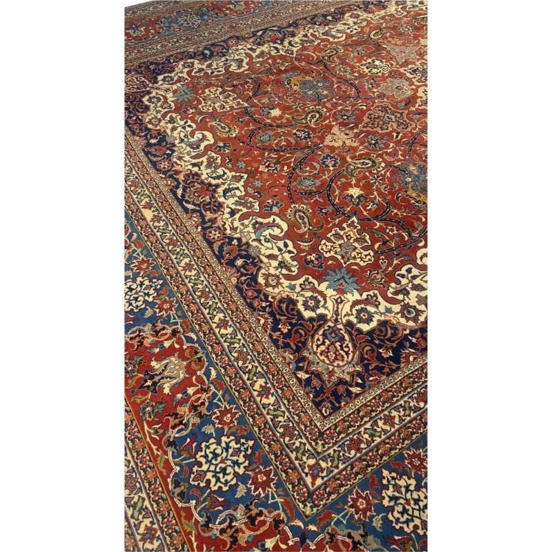 "Detailed view of luxury hand-knotted Isfahan rug with traditional mid-century motifs"