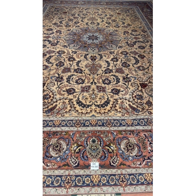Full display of the Handcrafted Silk Rufugaran Rug with its symmetrical medallion design