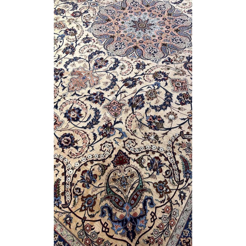 Close-up of the floral patterns on the Handcrafted Silk Rufugaran Rug