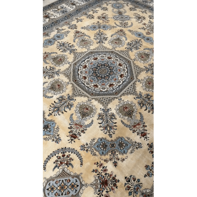 Close-up of the corner design of an artisan Isfahan rug, highlighting the intricate floral patterns in silk and wool.