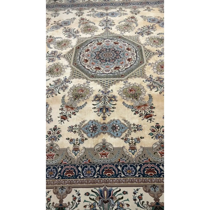 Luxurious artisan rug featuring a chevron pattern with delicate floral motifs, handmade with silk and wool in Isfahan, Iran.