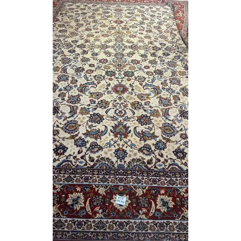 Oriental rug with a detailed floral motif set against a rich, textured background