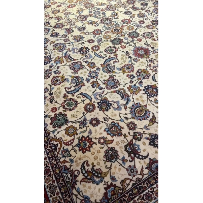 Oriental rug showcasing an elaborate floral pattern throughout its design