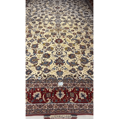 Close-up of an oriental carpet highlighting the interplay of red and blue in the border design