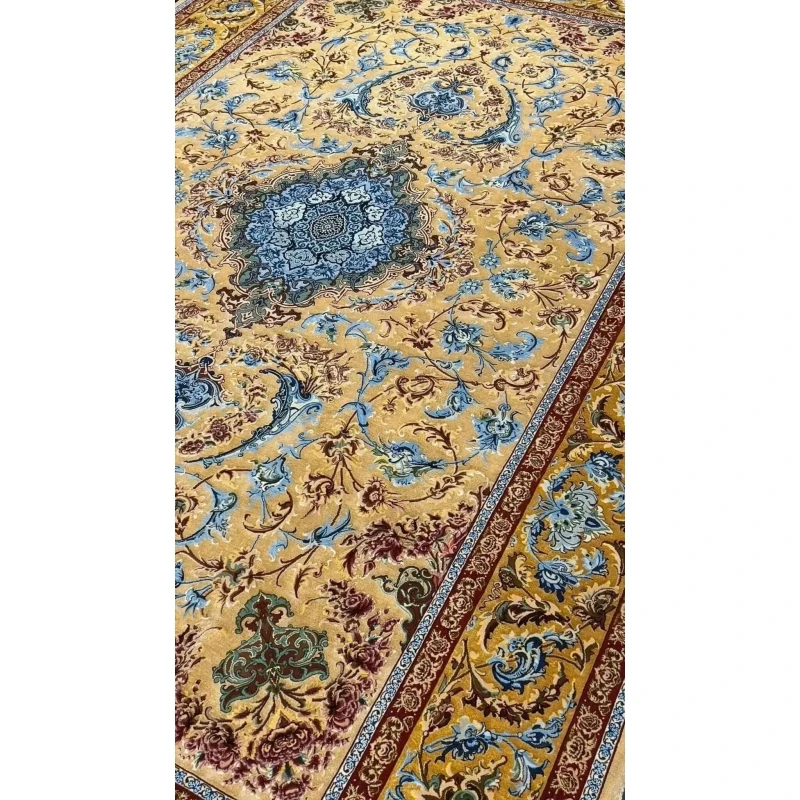 Elegant Mohaghegh silk carpet featuring blue and golden motifs