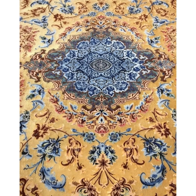 Mohaghegh silk carpet showcasing a prominent central medallion design