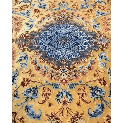Mohaghegh silk carpet showcasing a prominent central medallion design