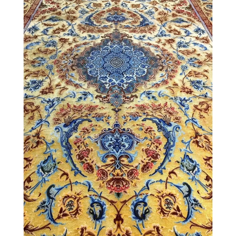 Mohaghegh's fine silk carpet with sophisticated blue and golden ornamentation