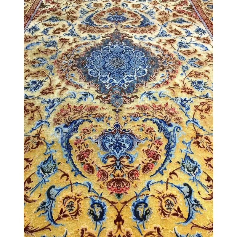 Mohaghegh's fine silk carpet with sophisticated blue and golden ornamentation