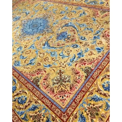 Mohaghegh's ornate silk carpet with a luxurious blue, red, and gold pattern