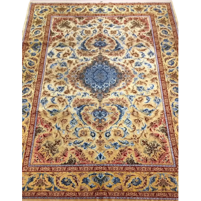 Luxurious Mohaghegh silk carpet with intricate blue, yellow, and red patterns
