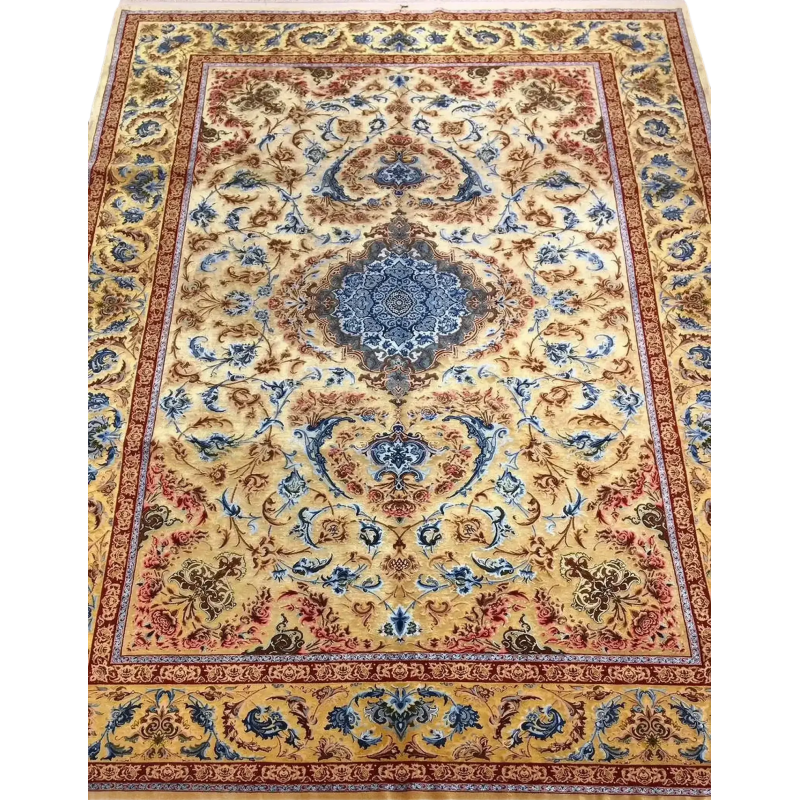Luxurious Mohaghegh silk carpet with intricate blue, yellow, and red patterns