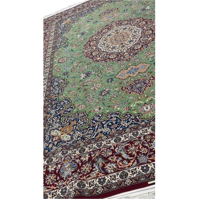 "Hand-knotted Isfahan rug with traditional colors and luxurious pile"