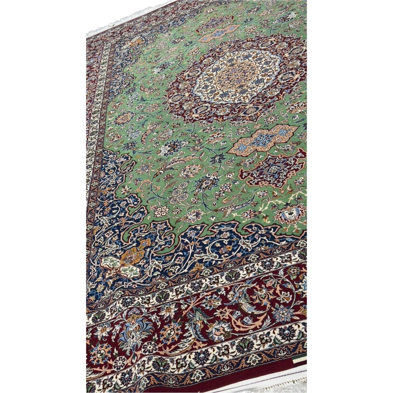 "Hand-knotted Isfahan rug with traditional colors and luxurious pile"