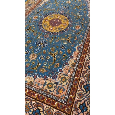 "Exquisite Persian Isfahan rug crafted from wool and silk, showcasing vibrant patterns, made by Master Haghighie."