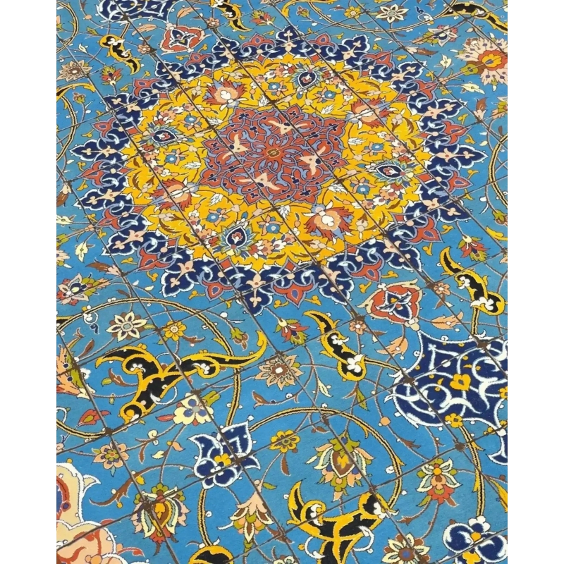 "Close-up view of a Persian Isfahan rug’s stunning medallion, surrounded by detailed floral motifs and elegant borders."
