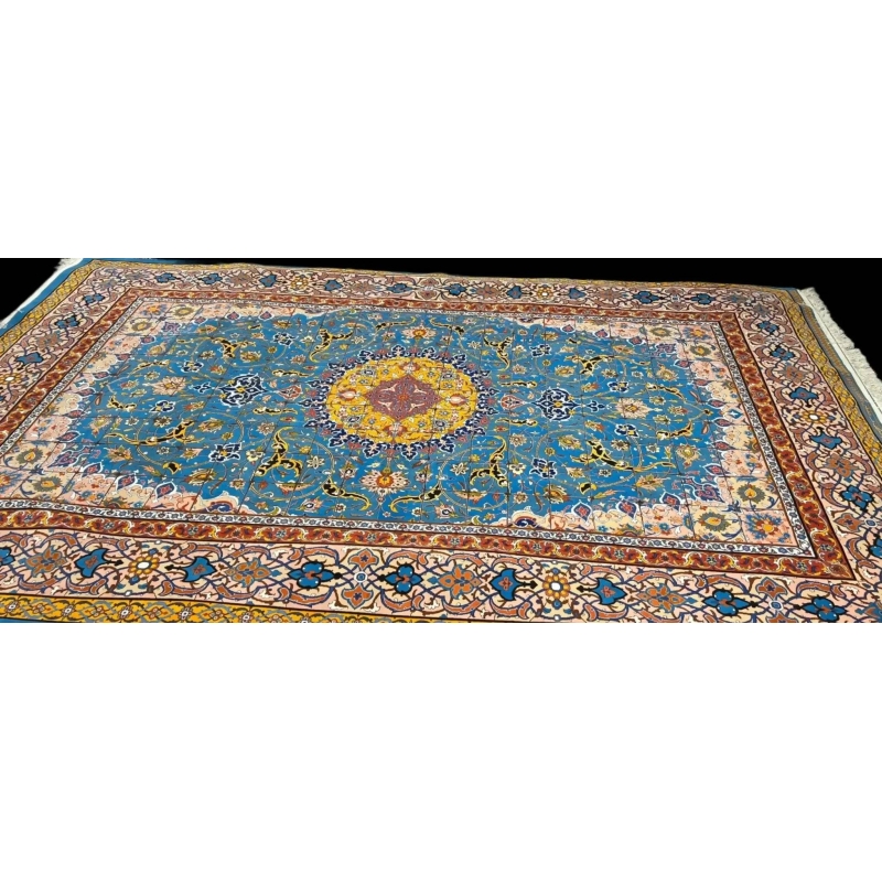 "Fine Persian Isfahan rug, showcasing a central medallion and intricate patterns, hand-knotted in wool and silk by Master Haghighie."