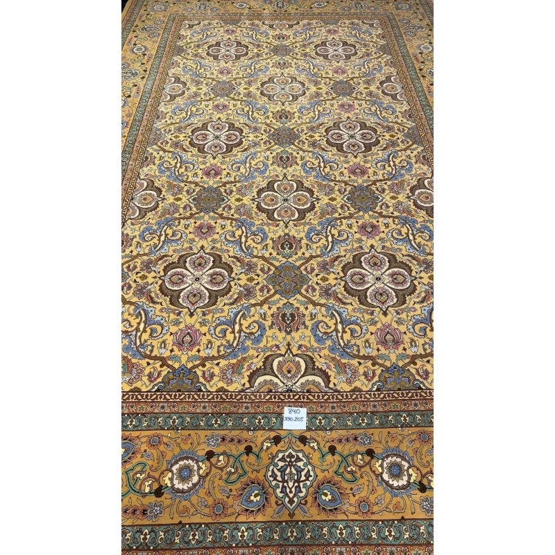 Handcrafted wool and silk carpet by Master Weaver Haghieghie with intricate patterns