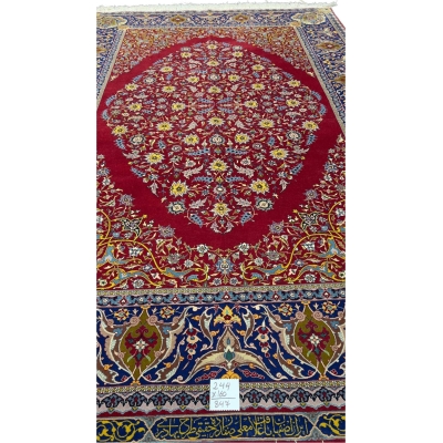 "70-year-old collectible red Persian rug with natural fibers and fine wool"