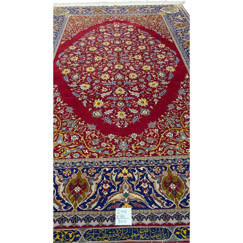 "70-year-old collectible red Persian rug with natural fibers and fine wool"