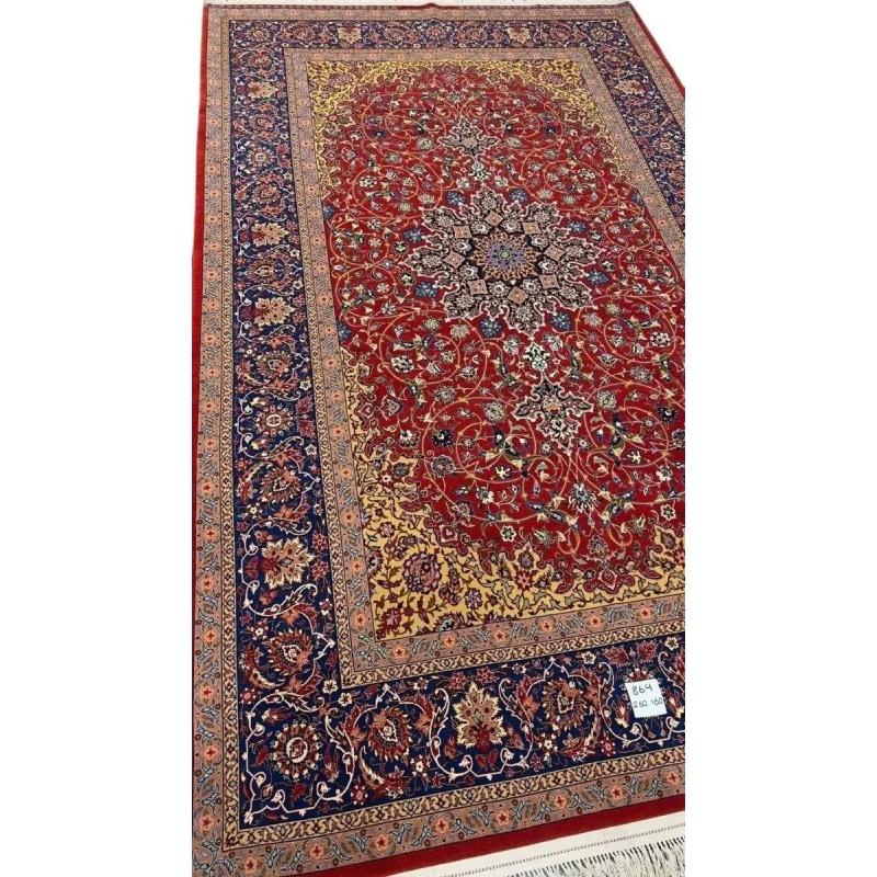 High-quality Persian rug designed with floral patterns and golden highlights.