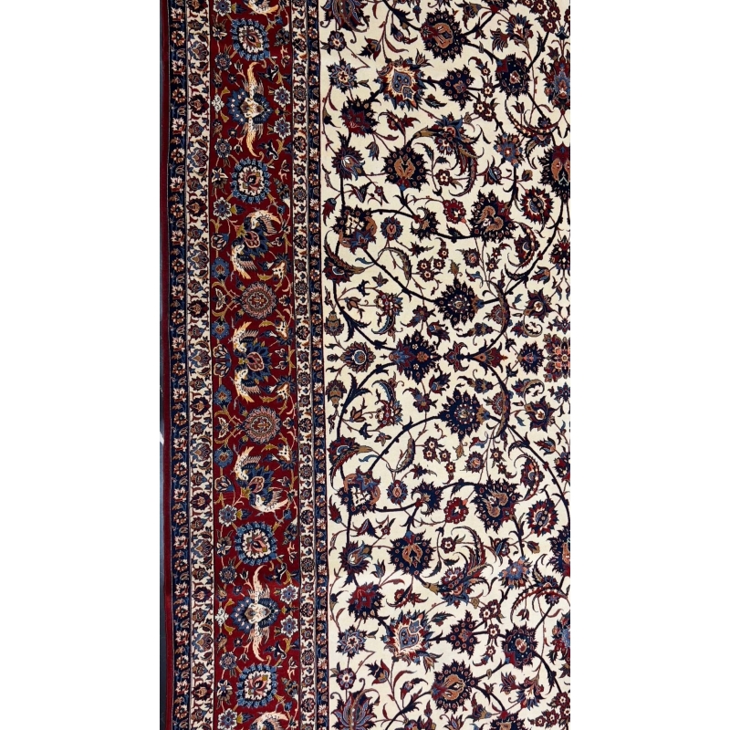 70-year-old red and beige Persian rug made of wool and silk with intricate design