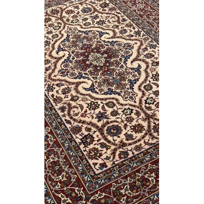 Vintage antique rug with intricate blue and red patterns, preserved for over 50 years