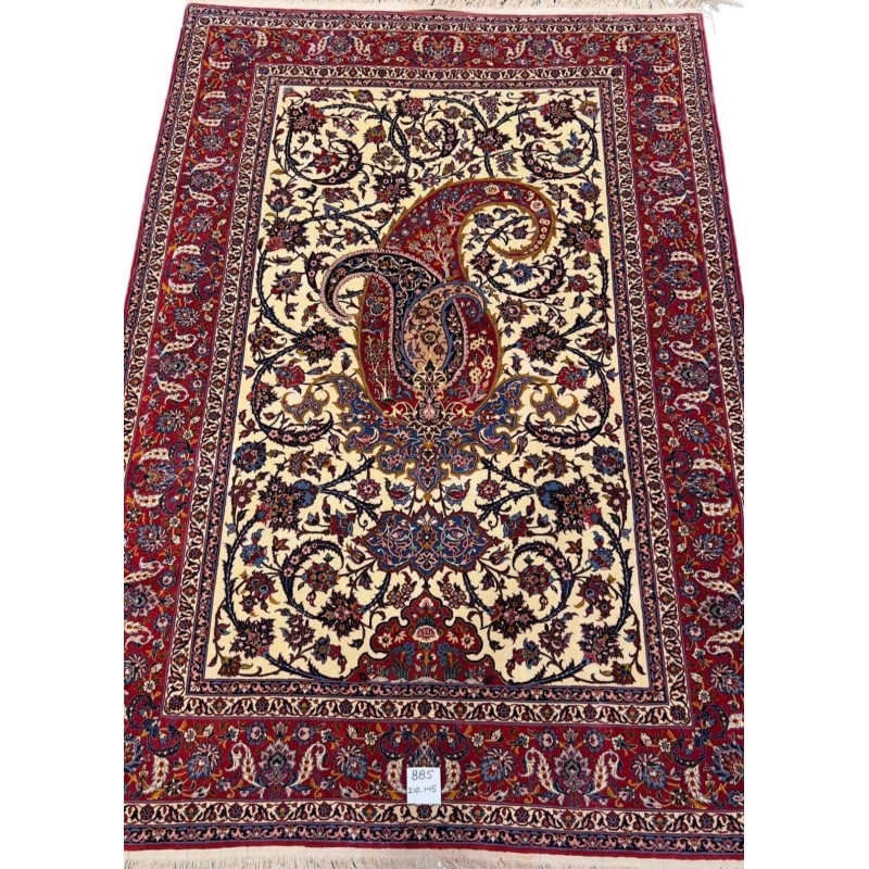 80-year-old antique Persian rug with intricate floral designs, 210 x 145 cm.