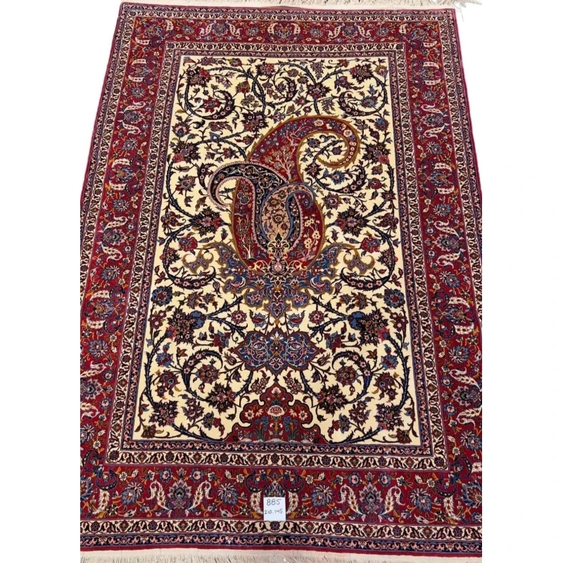 80-year-old antique Persian rug with intricate floral designs, 210 x 145 cm.