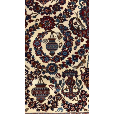 Antique 75-year-old Persian rug with intricate floral patterns