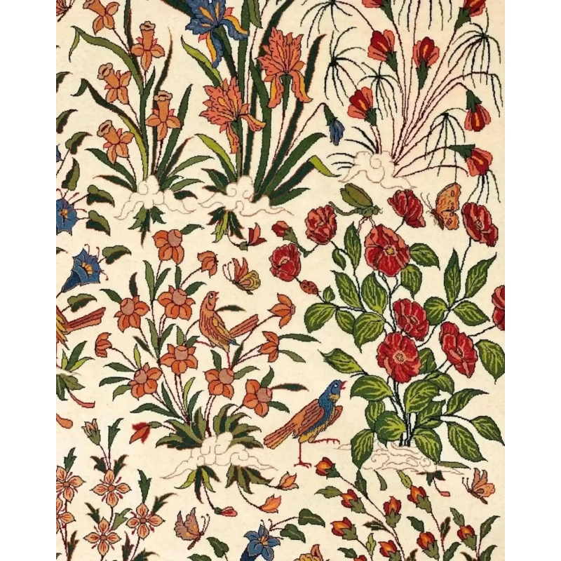 "Persian rug from Isfahan with delicate floral and bird motifs, made from a blend of silk and wool, 240x160 cm."