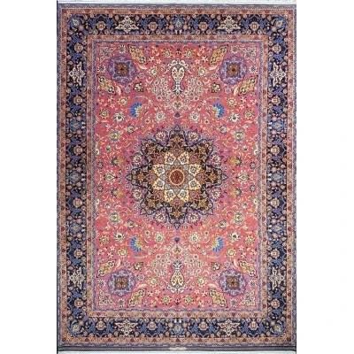 Hand-knotted purple oriental rug with intricate floral patterns, highlighting a vibrant medallion in the center, surrounded by a decorative border.