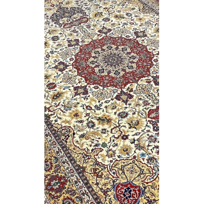 "Hand-knotted Isfahan rug by Master Seirafian, featuring a silk and wool pile."