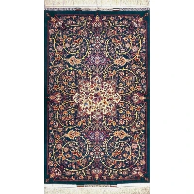 Emerald green Persian rug with intricate floral medallion design by Bagher Seirafian.