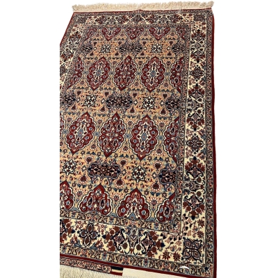 "40-year-old Persian rug by Master Ahmad Seirafian, featuring a luxurious blend of wool and silk in vibrant natural colors."