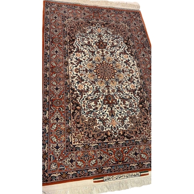 "Angled view of an authentic Seirafian Persian carpet, highlighting silk and wool materials with rich knot density and intricate designs."