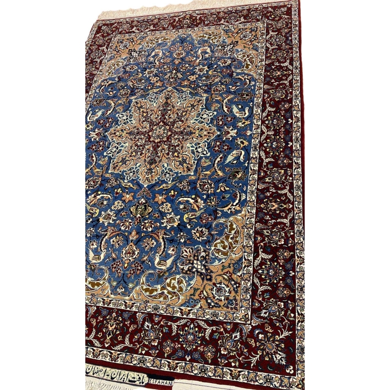 "Elegant Persian Seirafian rug with a floral medallion design in shades of blue, beige, and burgundy, crafted with silk and wool."