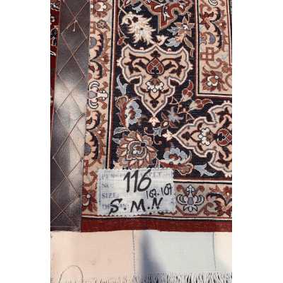 "Backside of a Seirafian Persian rug, showing the fine knot structure and craftsmanship, with silk warp and wool pile, handwoven in Isfahan."