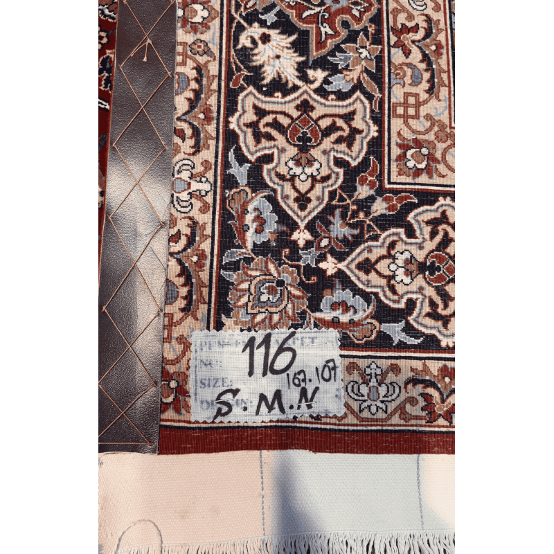 "Backside of a Seirafian Persian rug, showing the fine knot structure and craftsmanship, with silk warp and wool pile, handwoven in Isfahan."
