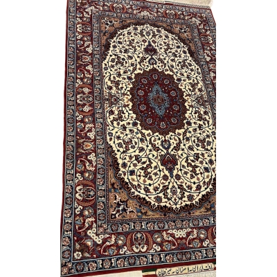 "Side view of a Seirafian Persian rug, displaying the detailed pattern, vibrant red tones, and high knot density typical of Isfahan rugs."